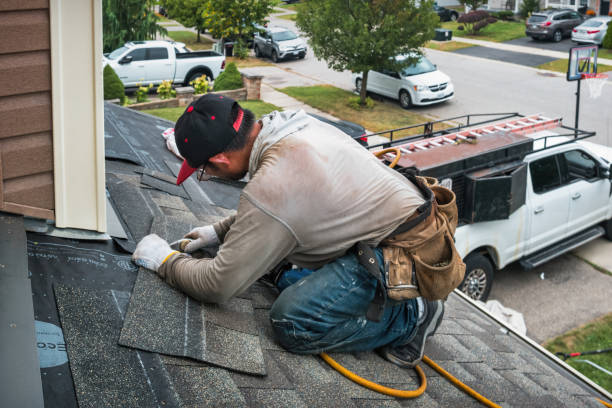 Professional Roof Replacement technician working in Gates, OR